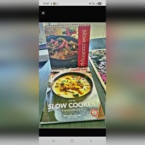 Set of 2 NEW slow cooker cookbooks. One stands alone, great photos.